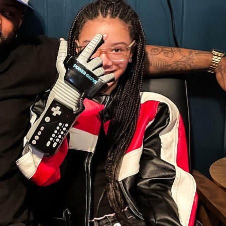 Harley Loraine Tiller showing her power gloves.